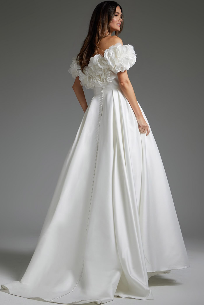 Model wearing Jovani JB40795 off-white gown, back view with buttons.