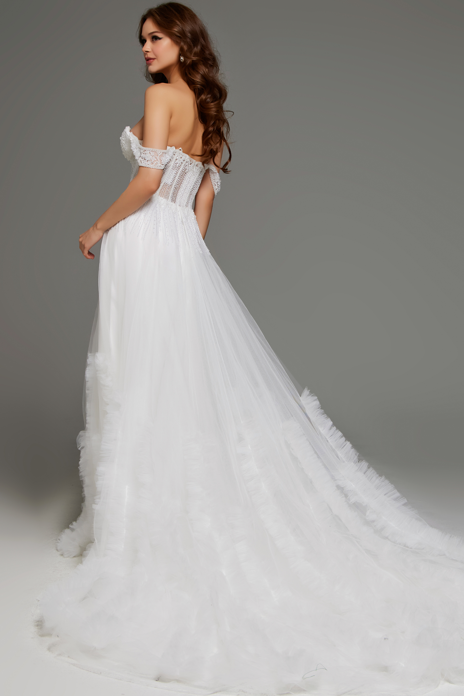 Back view of Jovani JB41159 white dress with off-shoulder sleeves.