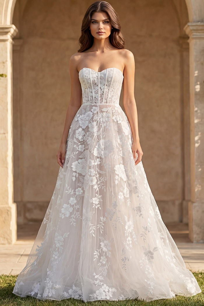 Embroidered floral strapless wedding dress with sheer corset bodice and full skirt