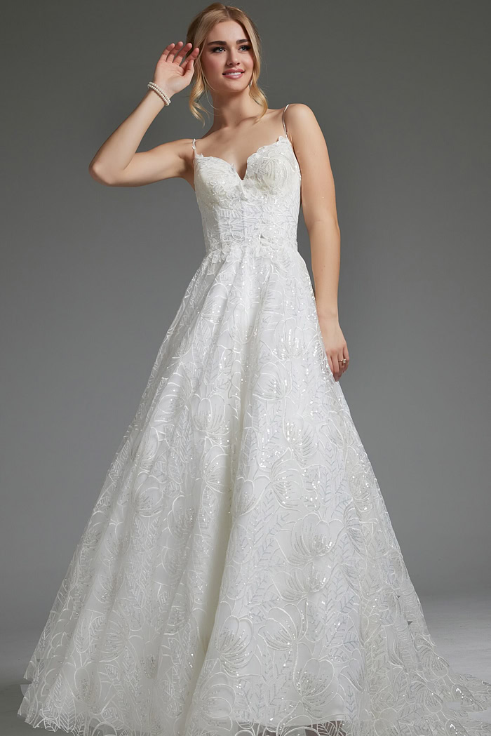 Model in Jovani JB422225 ivory gown with lace details and A-line silhouette, front view.