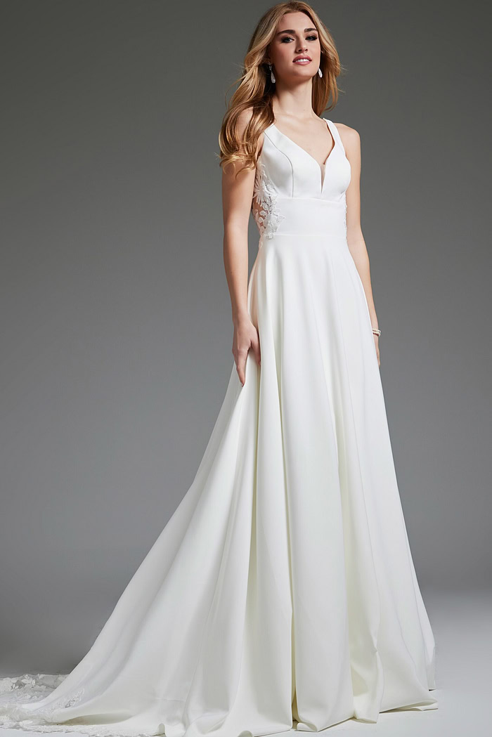 Model styled in Jovani JB42294 ivory dress, front view accentuating lace appliqués.