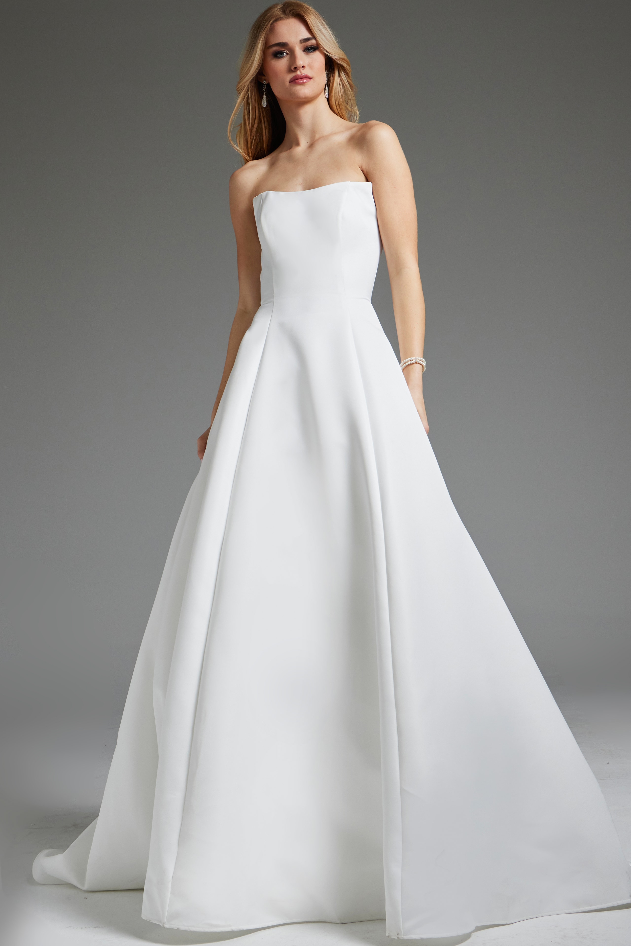 Model showcasing Jovani JB42346 in off-white, close view of the front.