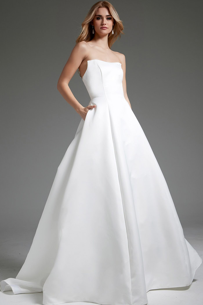 Model wearing Jovani JB42346, side view of elegant off-white dress.