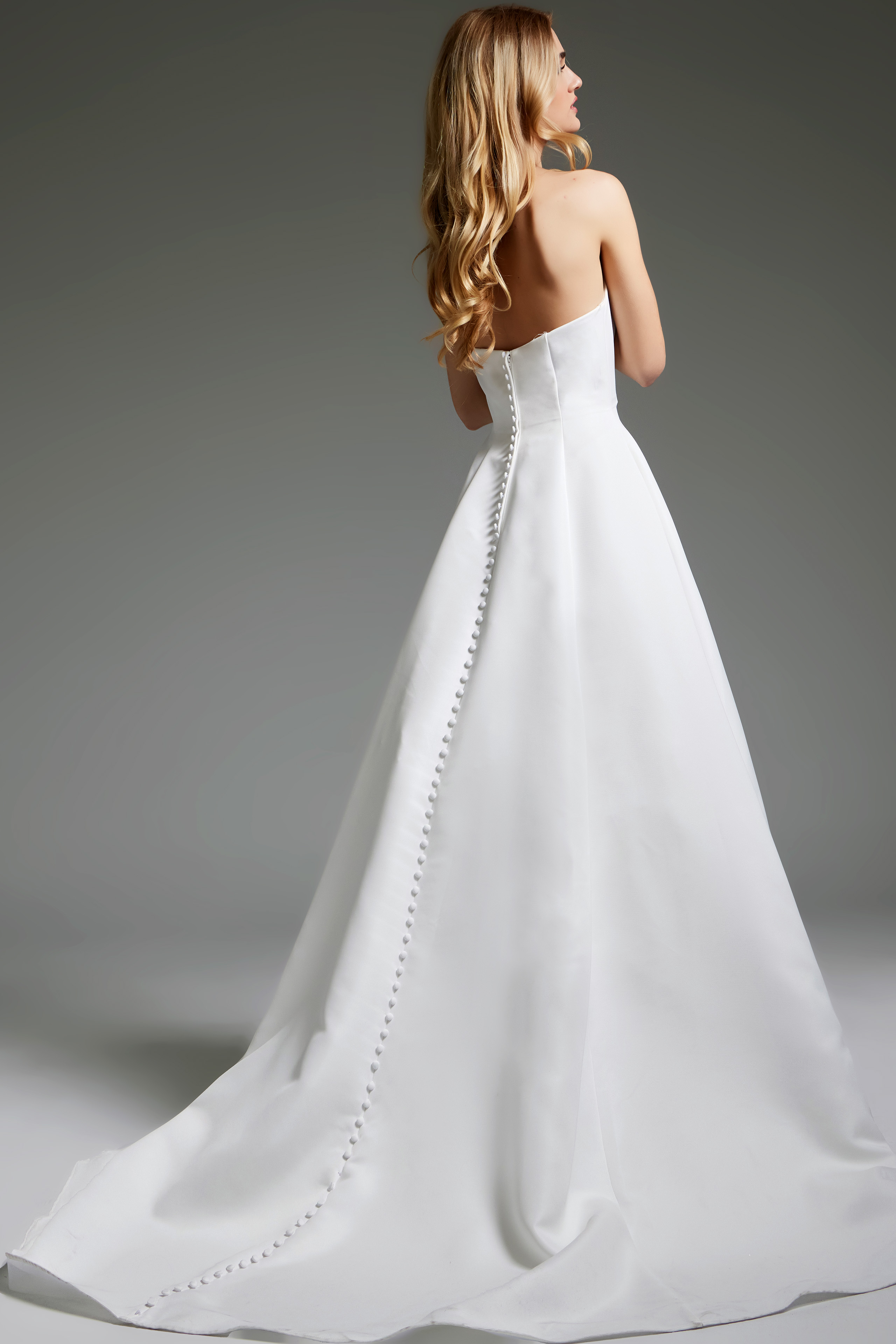Back view of Jovani JB42346 dress showing button details.