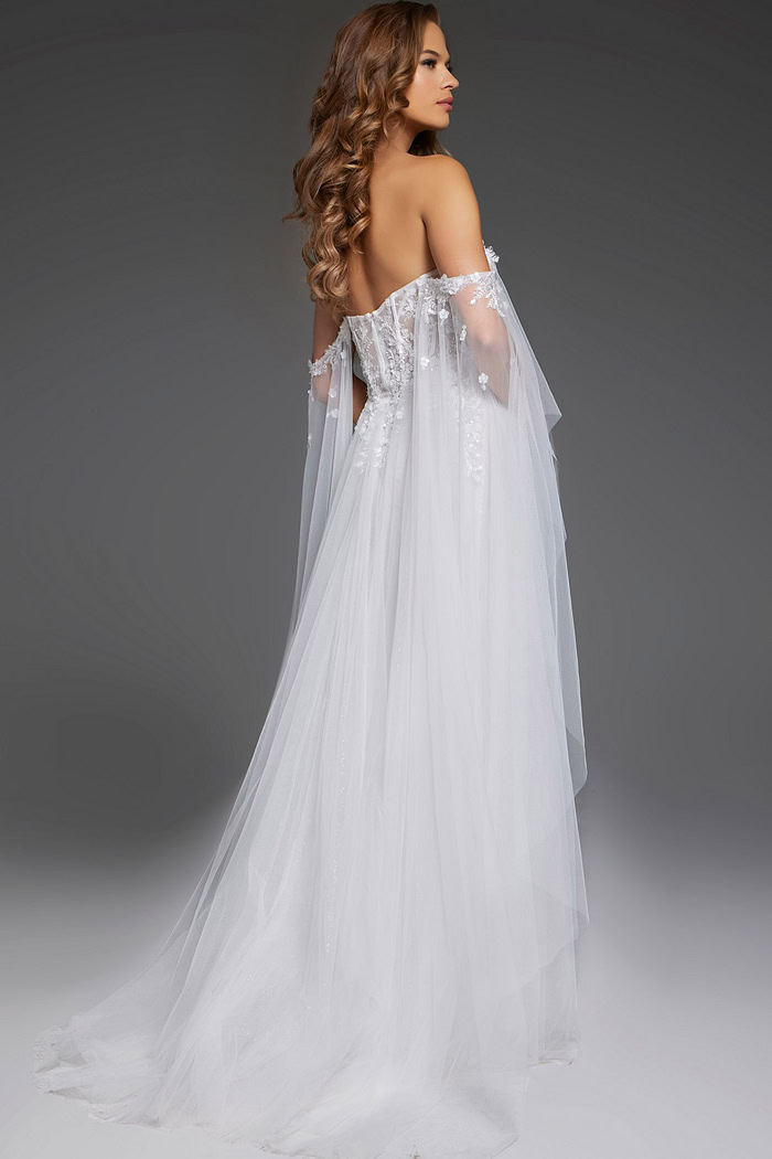 Model wearing Jovani JB42480 white gown, back view with cascading skirt