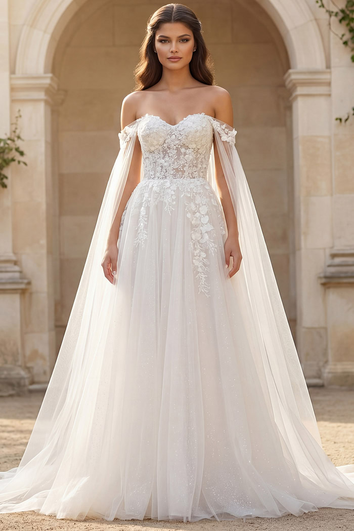 Off shoulder bridal gown with sheer tulle drape sleeves and lace lace up back