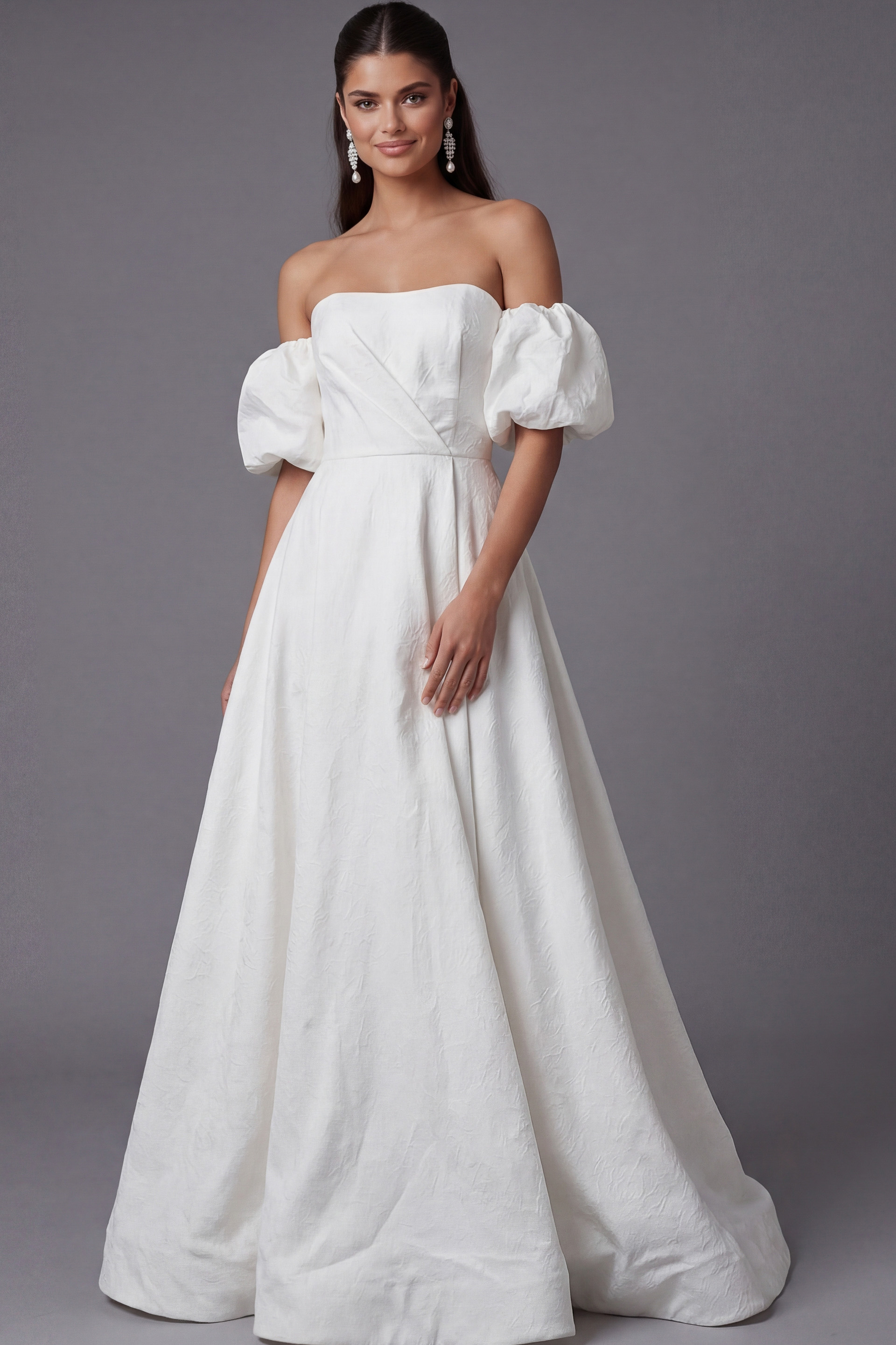 Bridal ball gown with dramatic puff sleeves and sweeping skirt