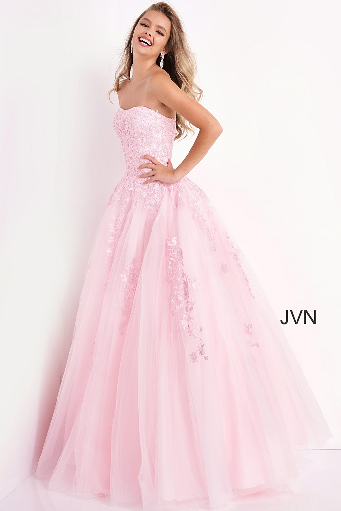Model wearing Jovani 1831 ball gown in pink, front view