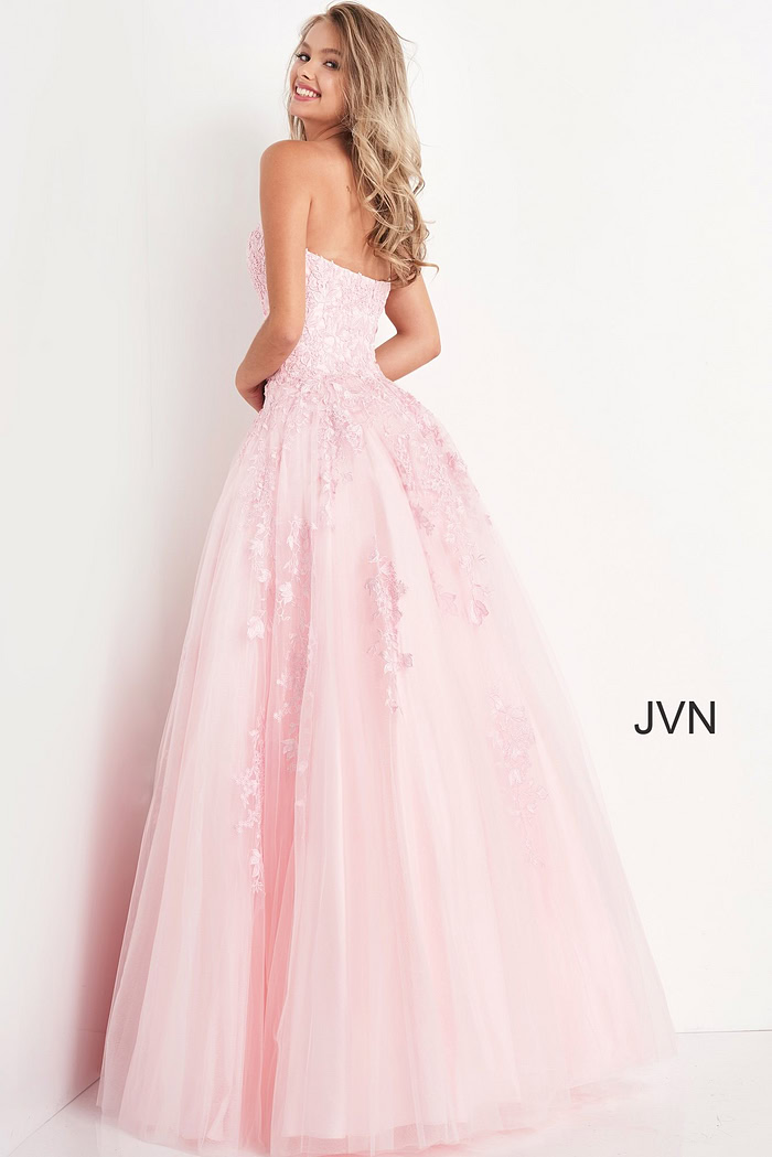 Model wearing Jovani 1831 ball gown in pink, back view