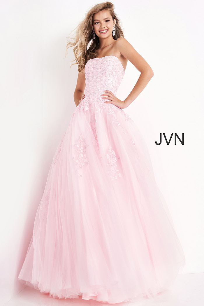 Model wearing Jovani 1831 ball gown in pink, side view