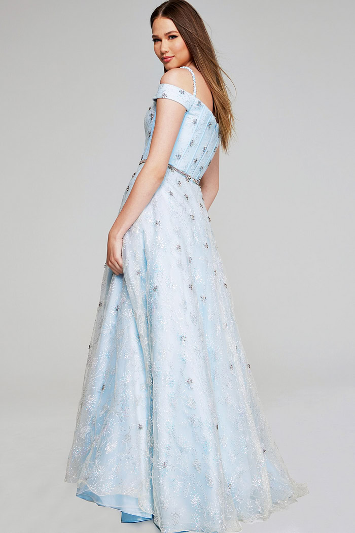 Model in Jovani K07282 light blue dress, showcasing the back design.