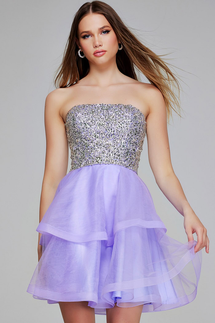 Model wearing Jovani K23666 lilac dress with layered tulle skirt, front view.