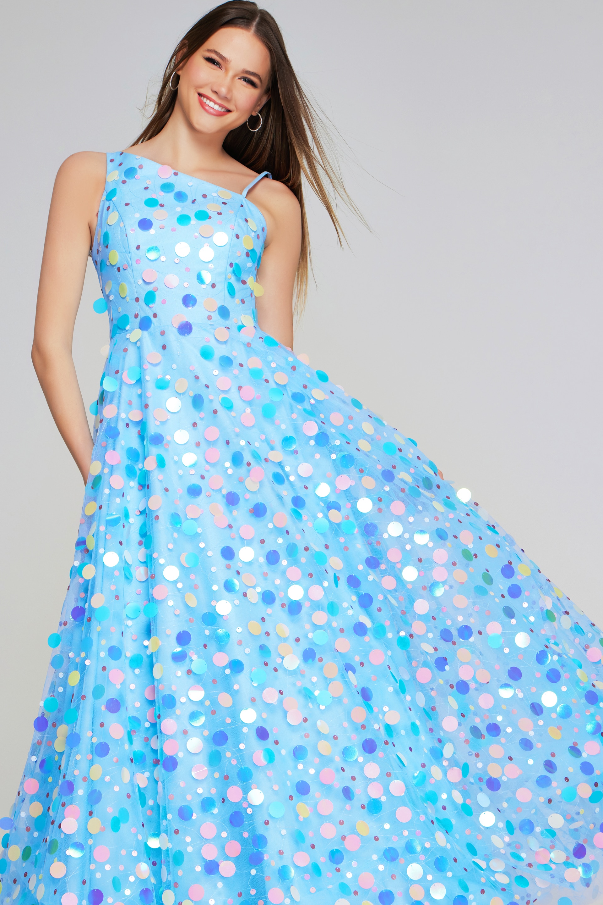 Model wearing K23877 elegant multi-colored A-line dress showcasing unique details from the front.