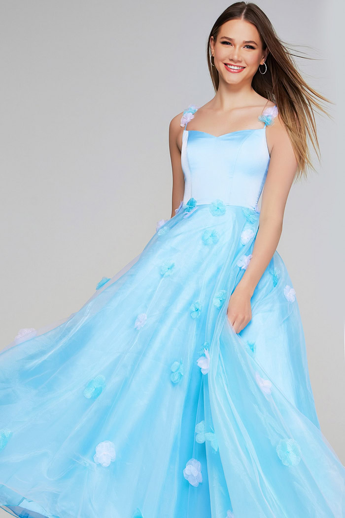 Model in Jovani K25988 light blue gown with floral details, front view.