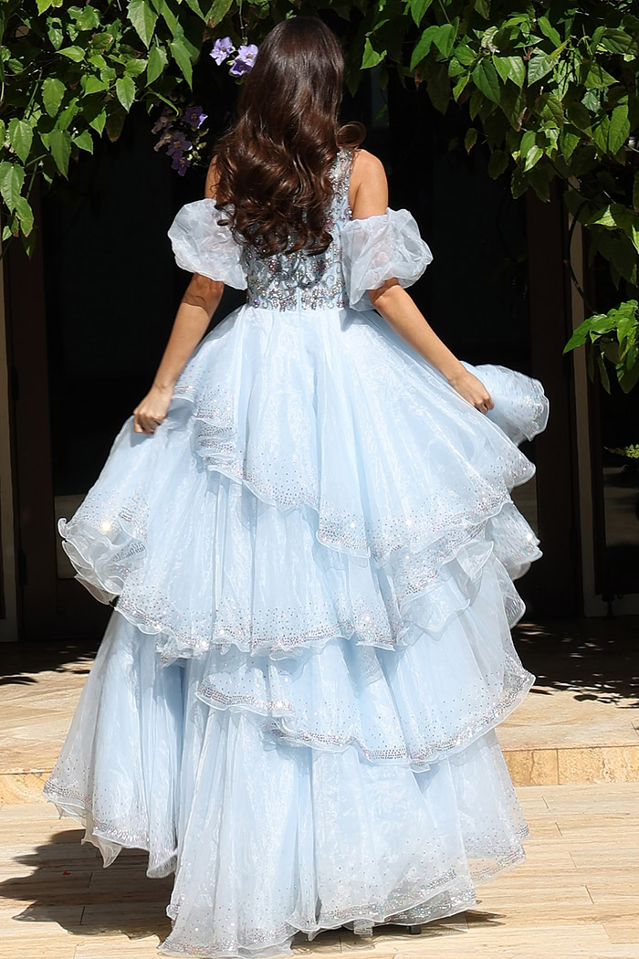 Off shoulder ruffle gown with layered skirt