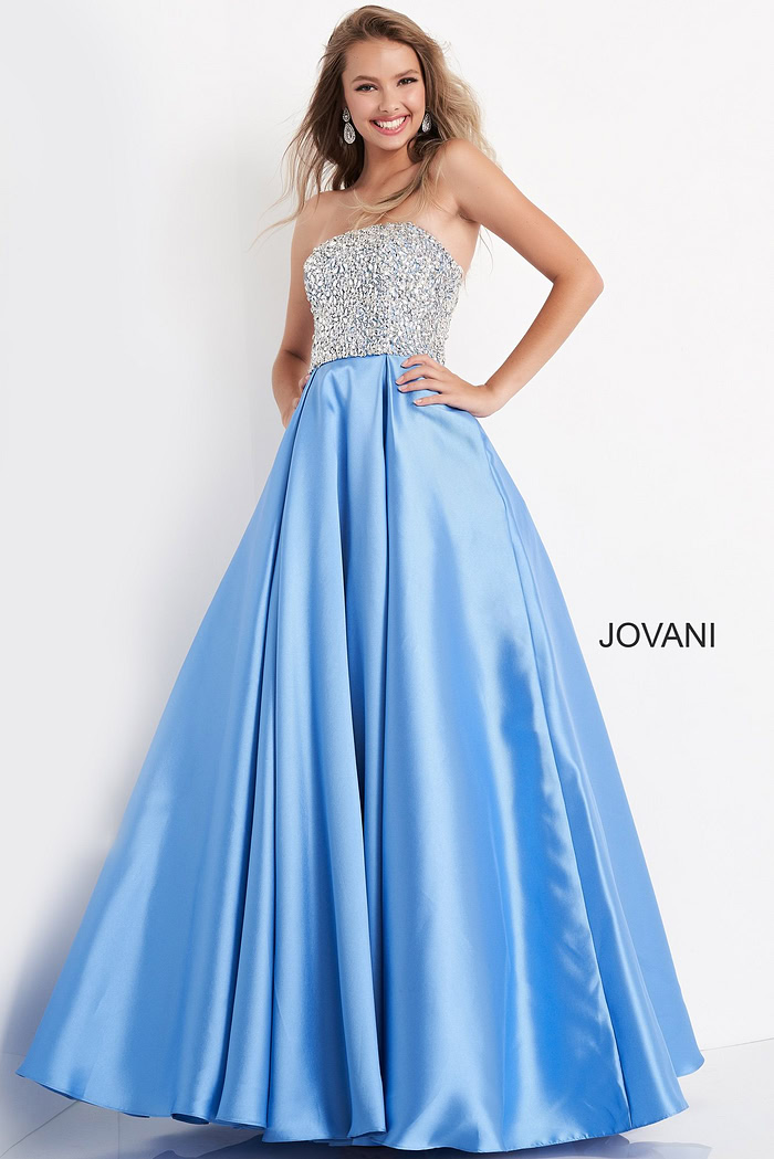 Model showcasing Jovani K66689 sky blue gown with embellishments