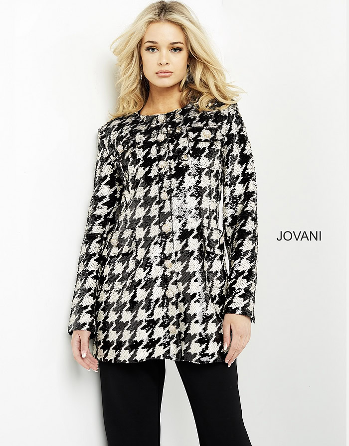 Model wearing M3393 front view black and ivory houndstooth dress with classic design.