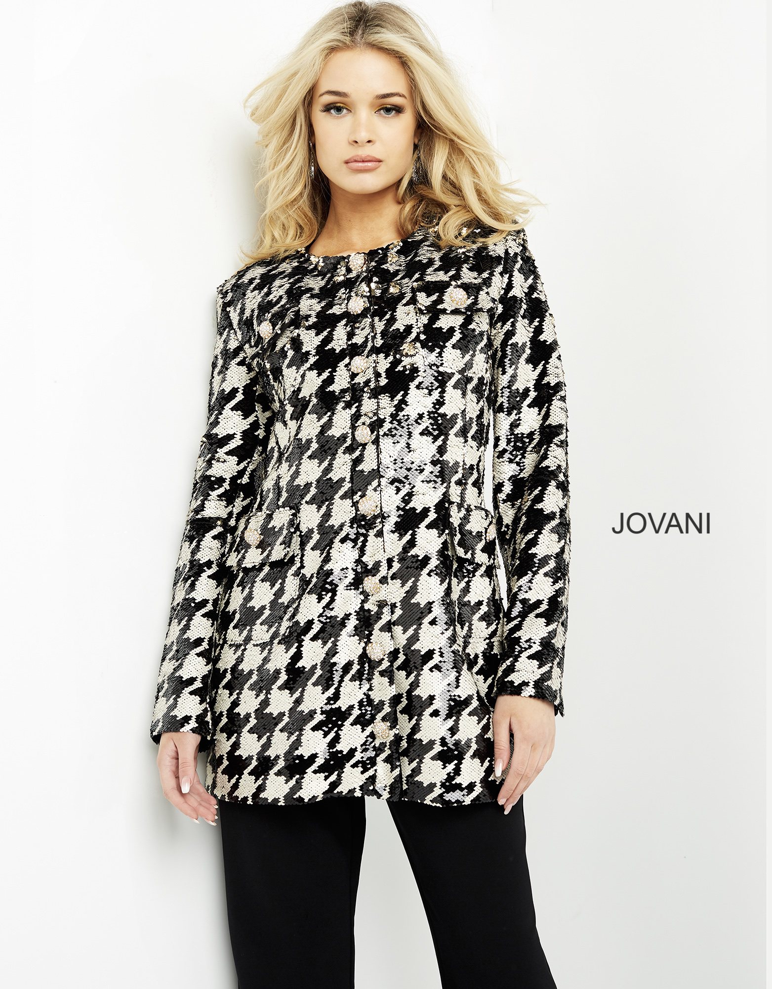 Model wearing M3393 front view black and ivory houndstooth dress with classic design.
