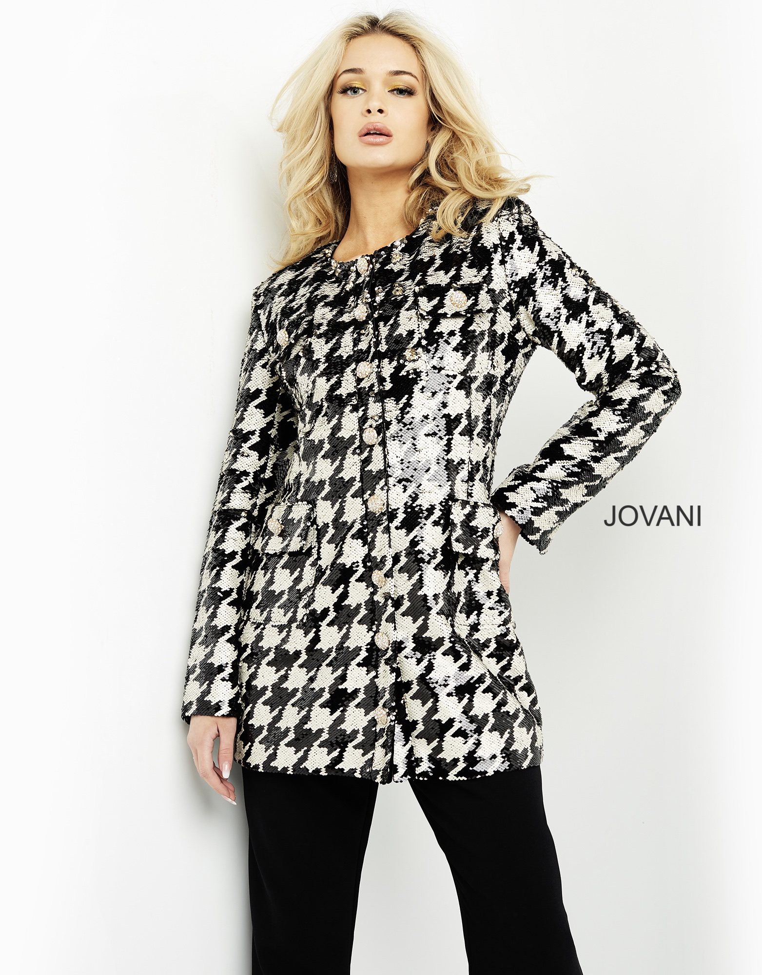 Front view of model wearing M3393 black and ivory houndstooth dress.