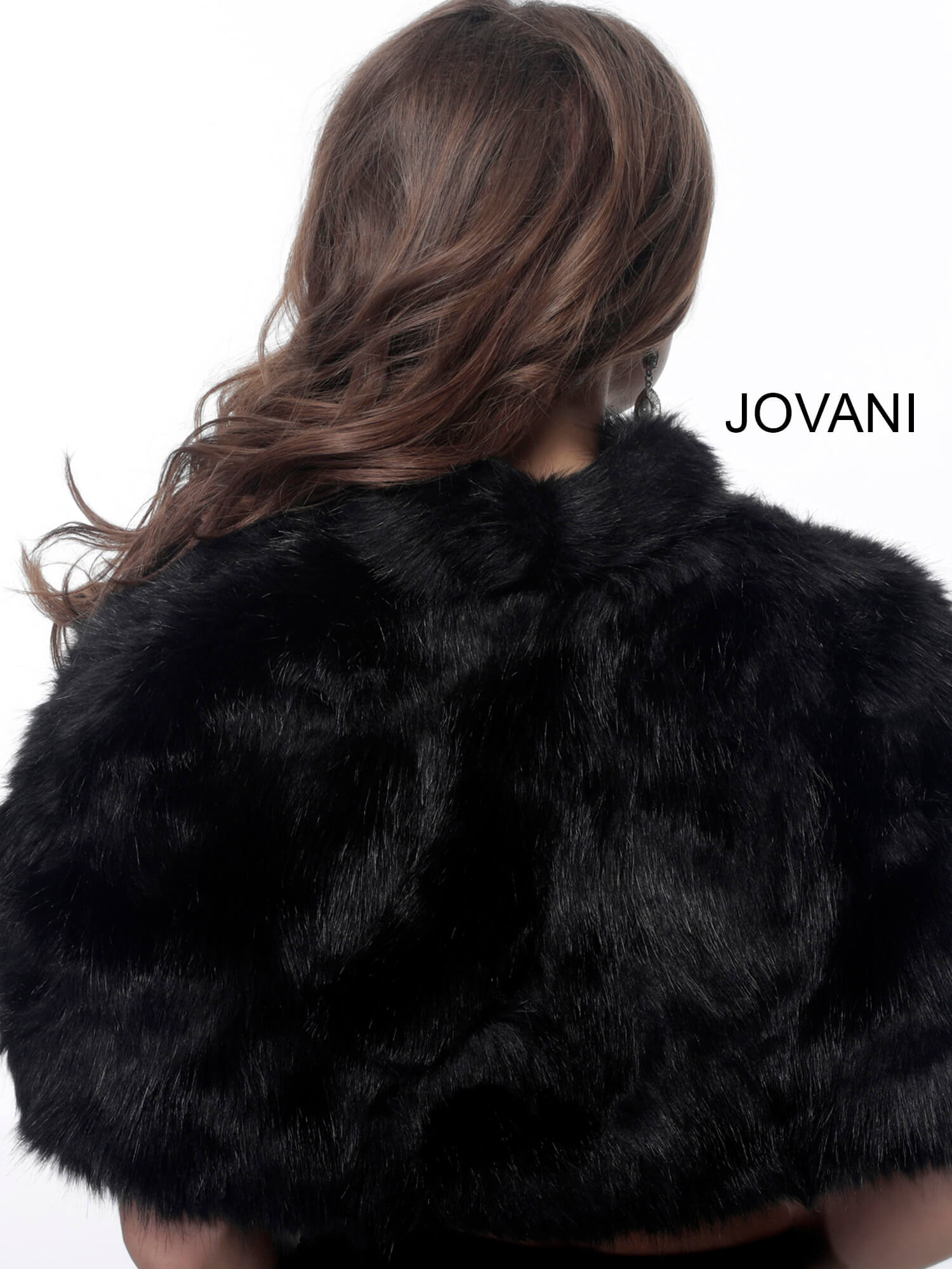 Model showing back view of Jovani M50165 black dress.