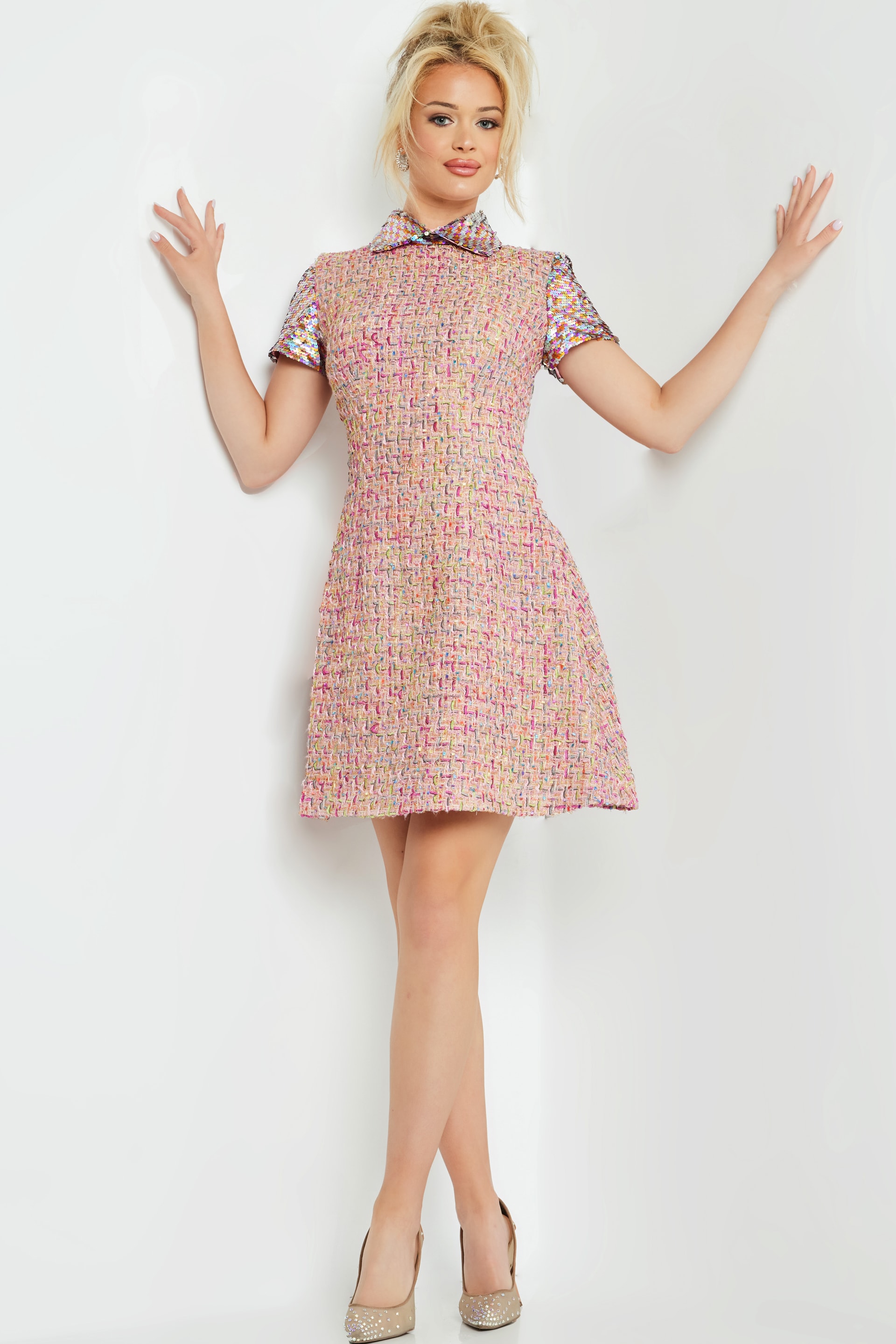 Model wearing M68930 multicolor tweed dress with collared neckline and short sleeves, front view.