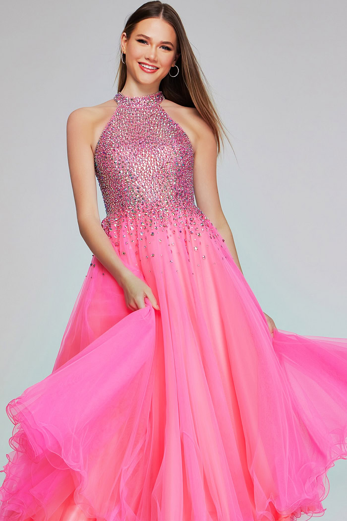 Model wearing k38284 hot pink dress with high halter neckline and sparkling details, full length front view.