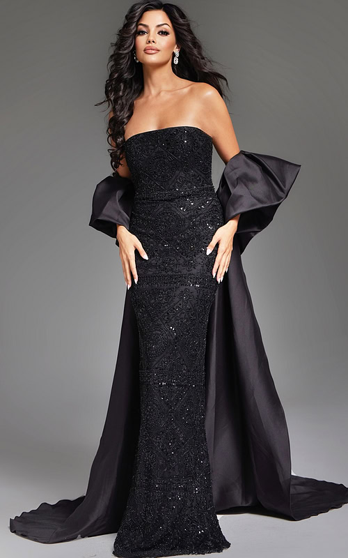 Model wearing Jovani 42137 black evening gown with embellishments, front view